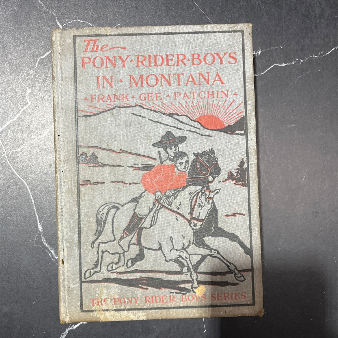 the pony rider boys in montana or the mystery of the old custer trail book, by frank gee patchin, 1910 Hardcover
